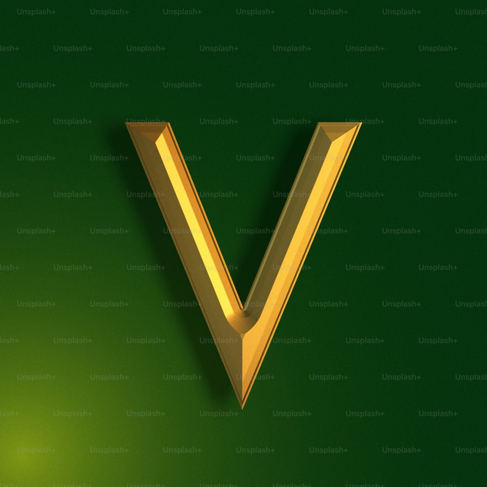 a gold v on a green background