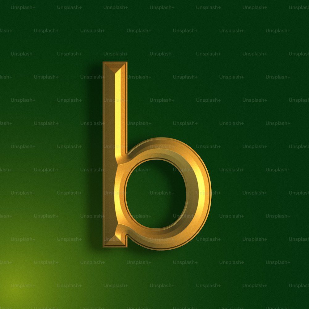 a gold letter that is on a green background