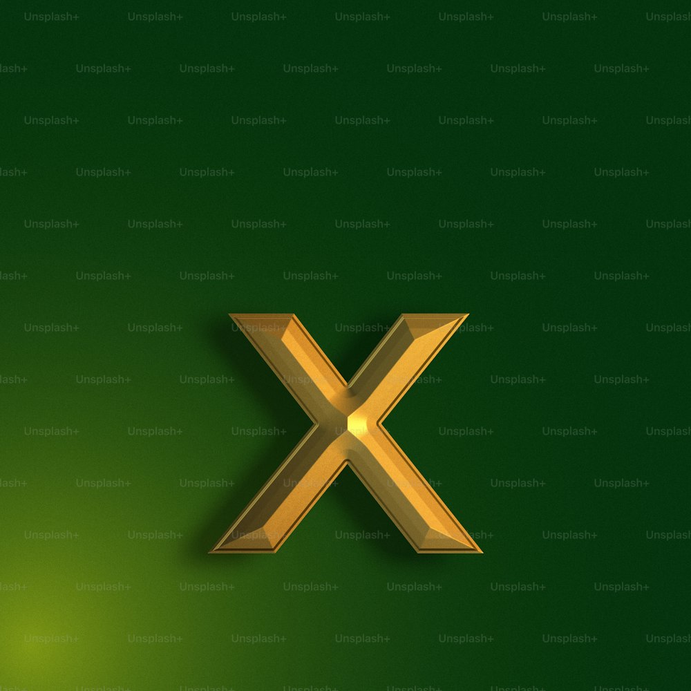 a gold x symbol on a green background