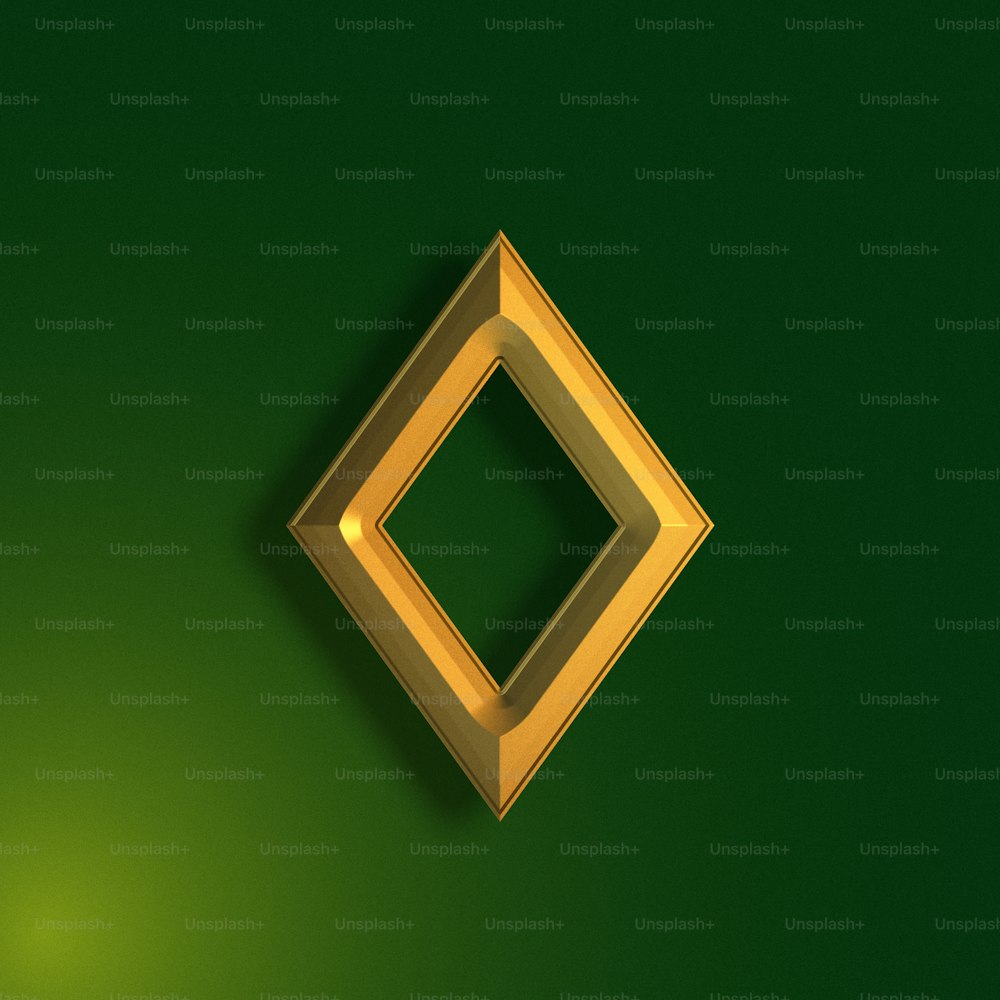 a gold diamond on a green background