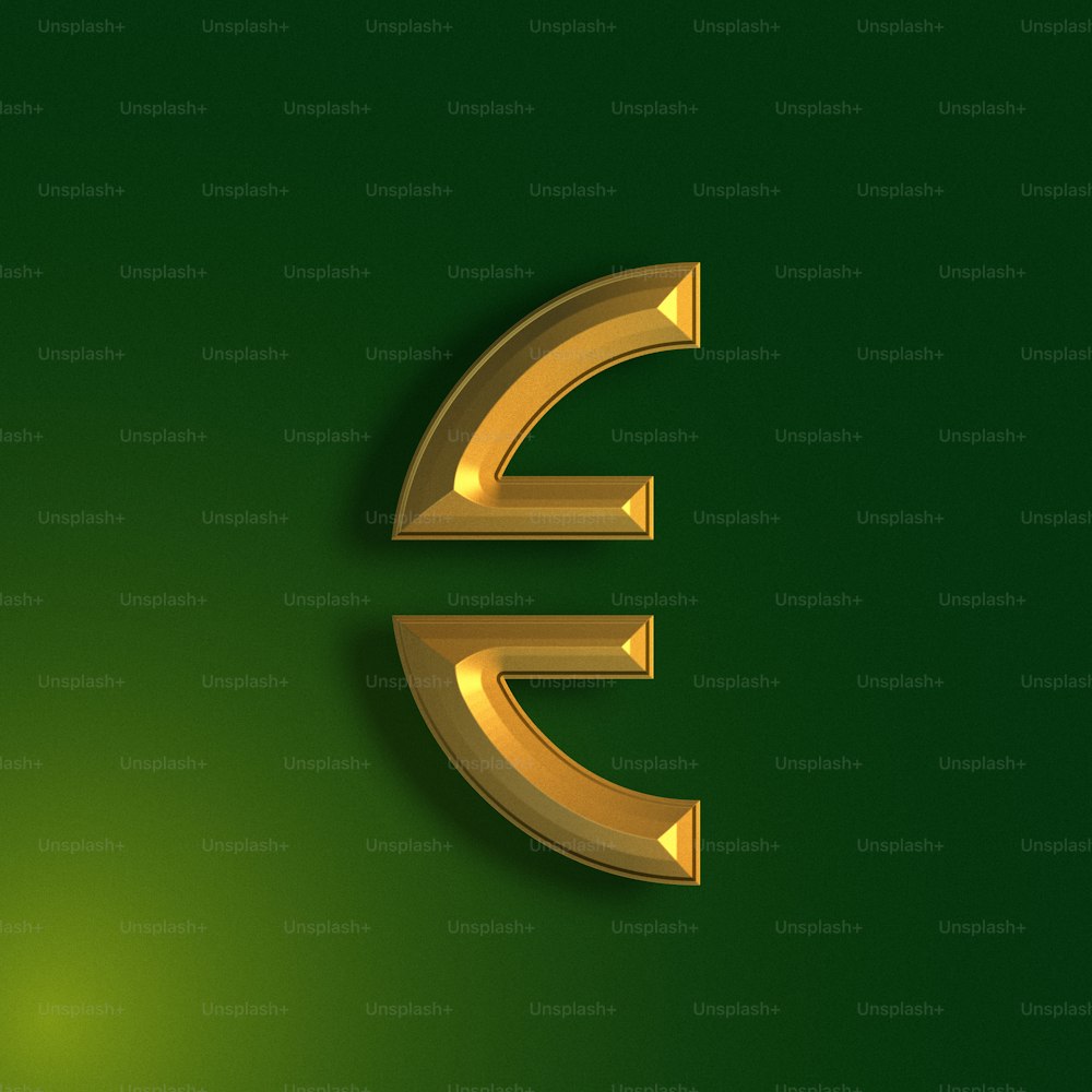 a gold letter e on a green background