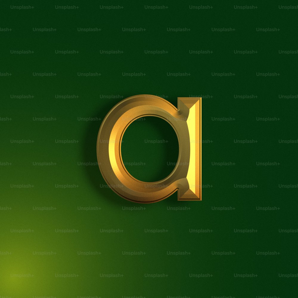 a golden letter on a green background