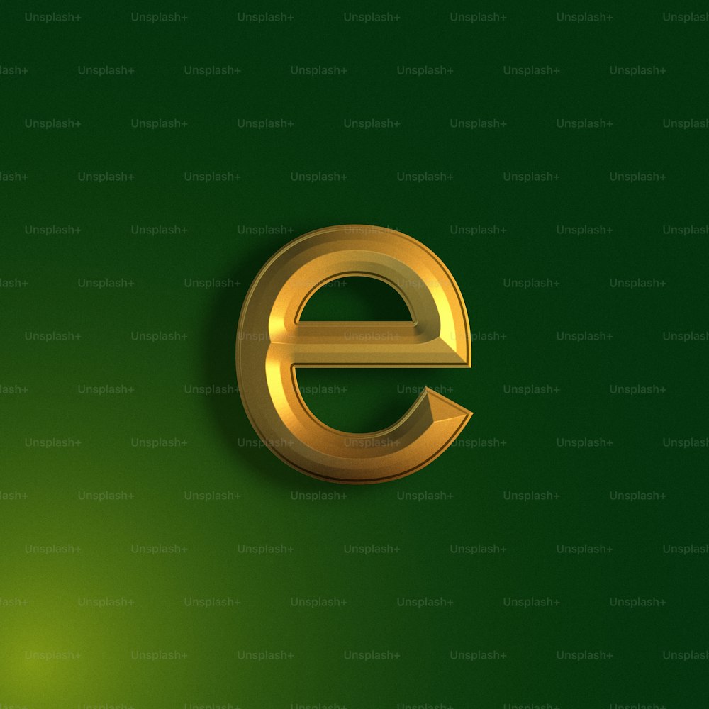 a gold letter e on a green background