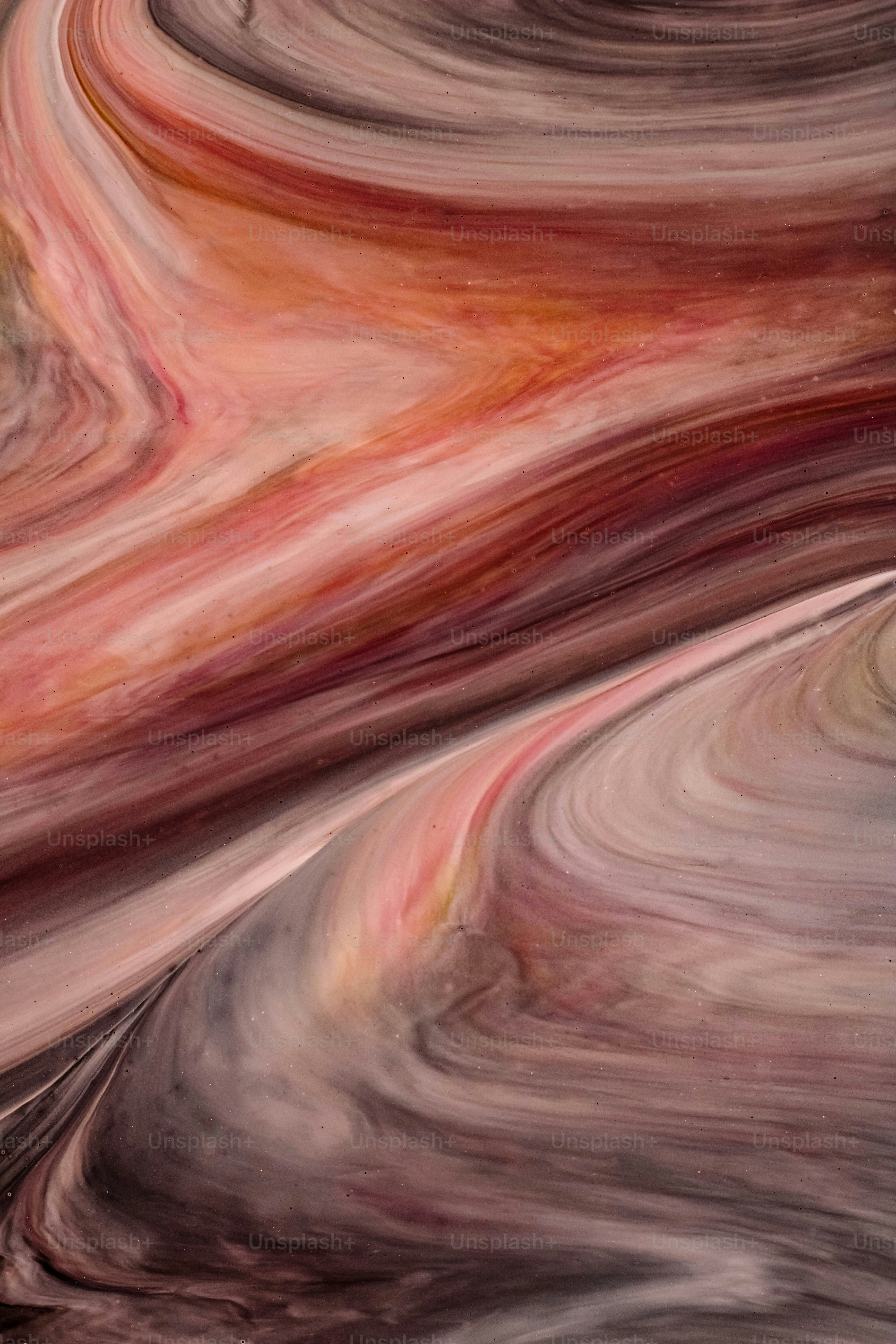 an abstract painting with a red, yellow, and purple swirl