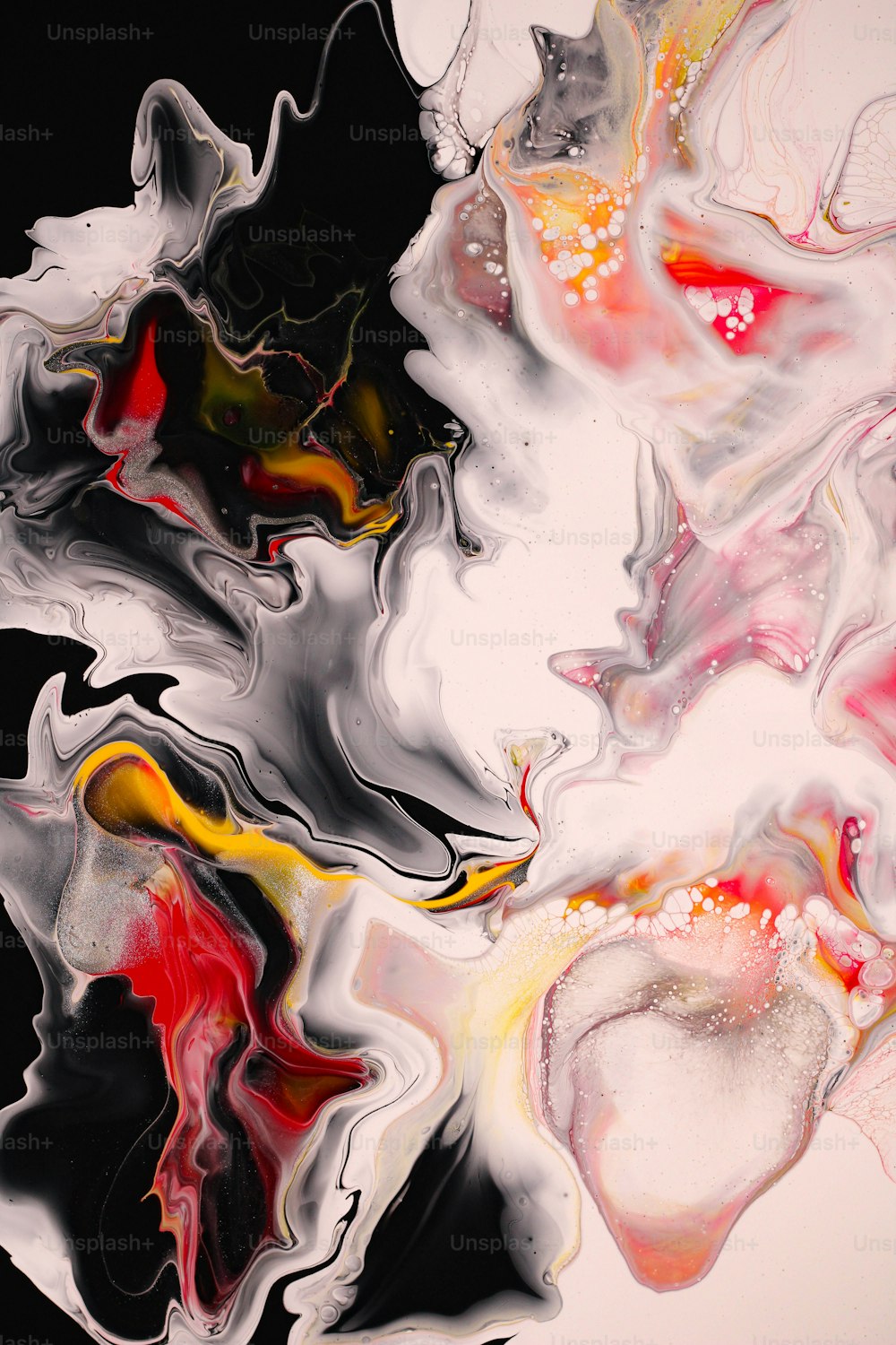 an abstract painting with black, red, yellow, and white colors