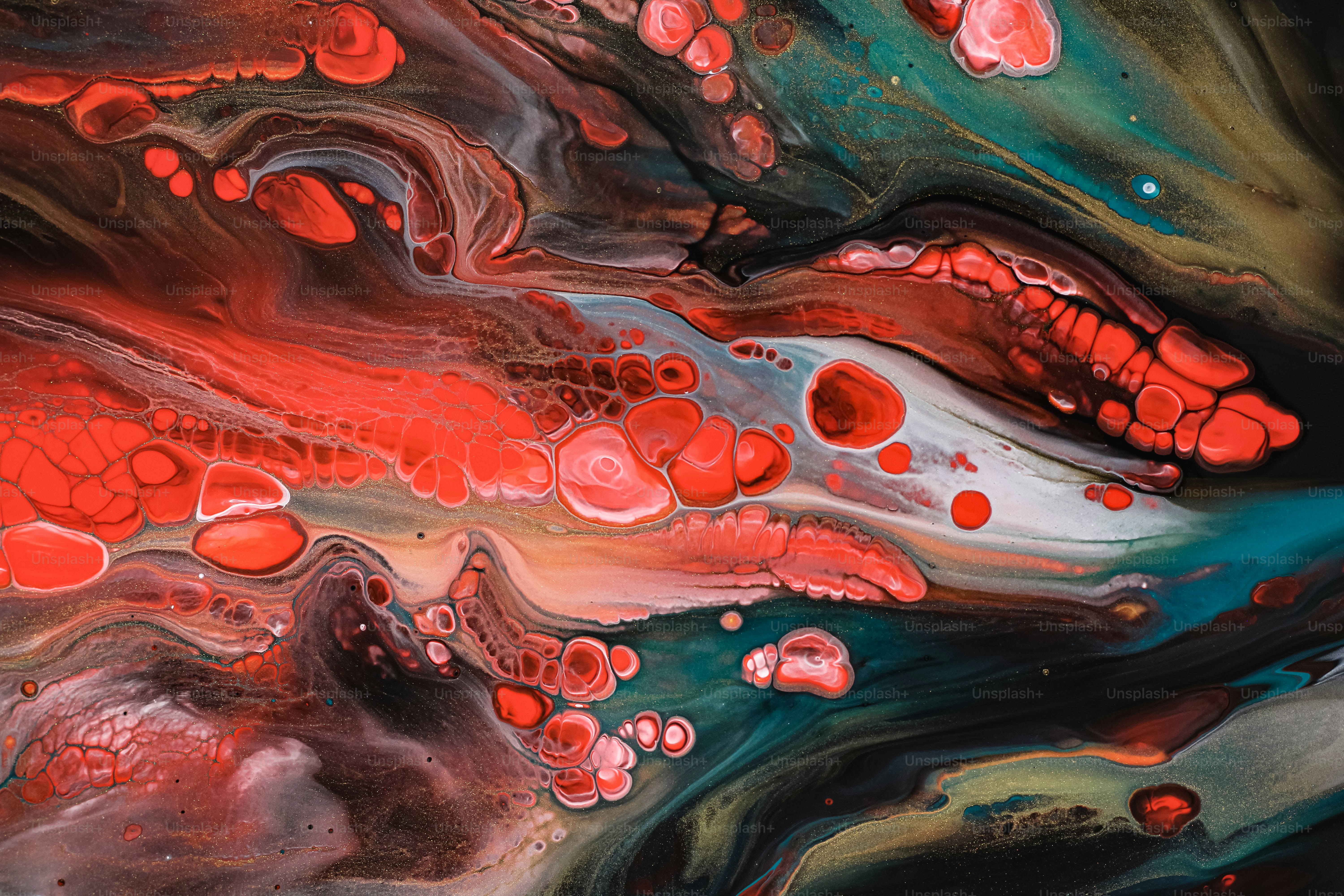 an abstract painting with red and green colors