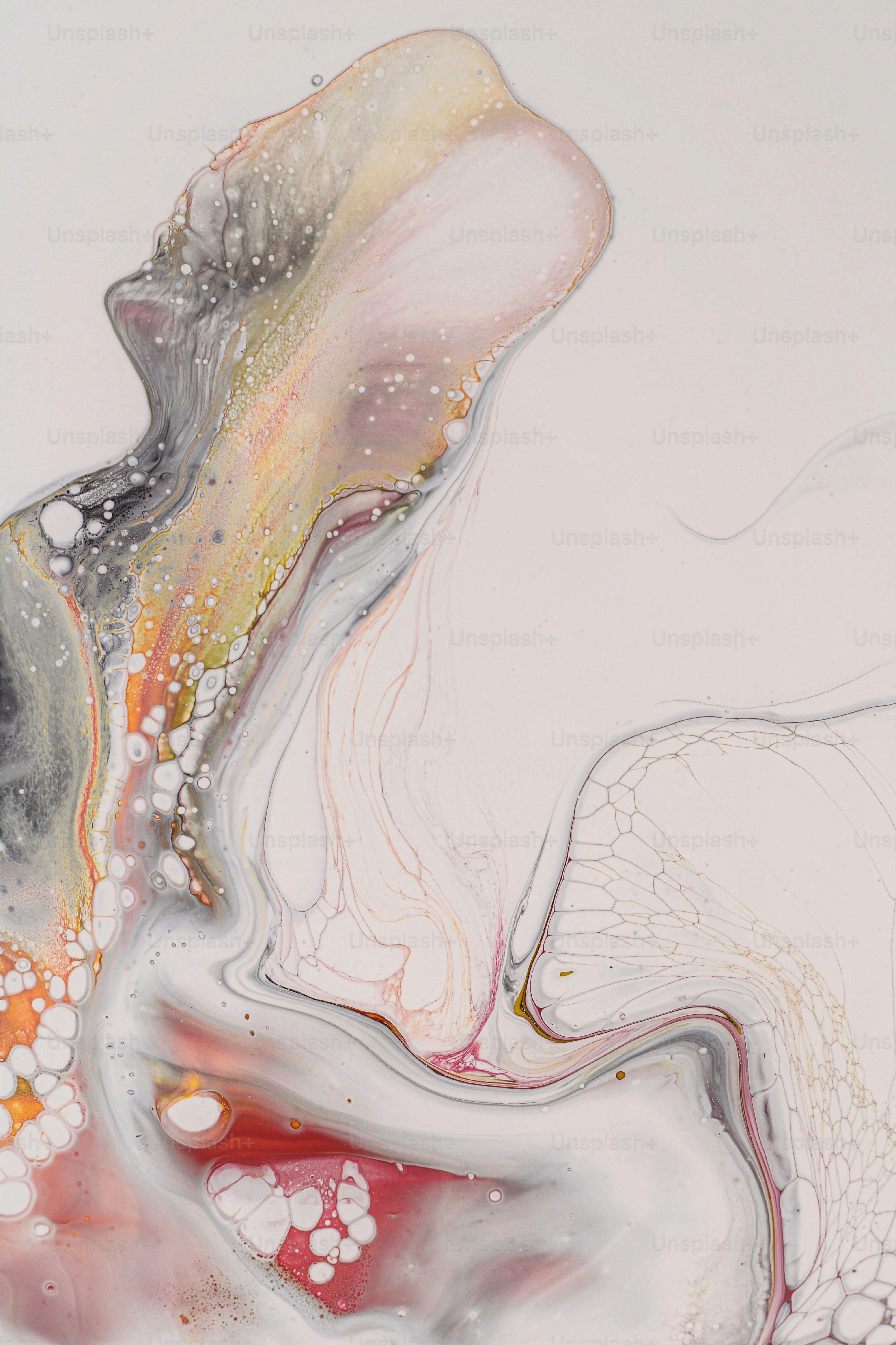 an abstract painting of a white, yellow, and red substance