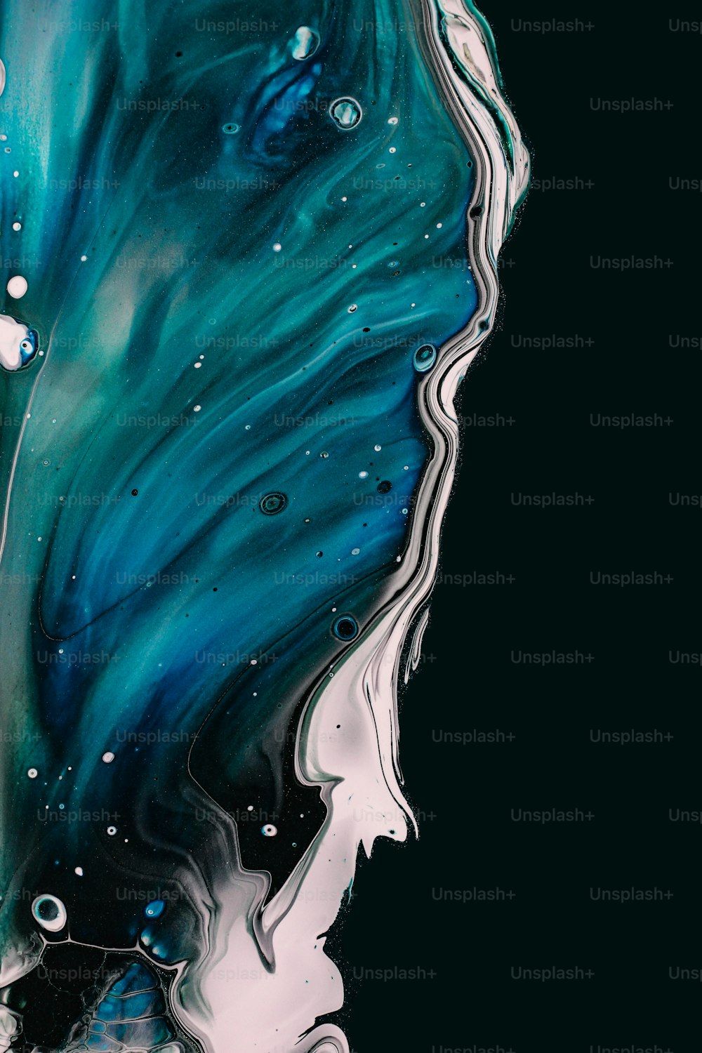 a painting of a blue and white swirl on a black background
