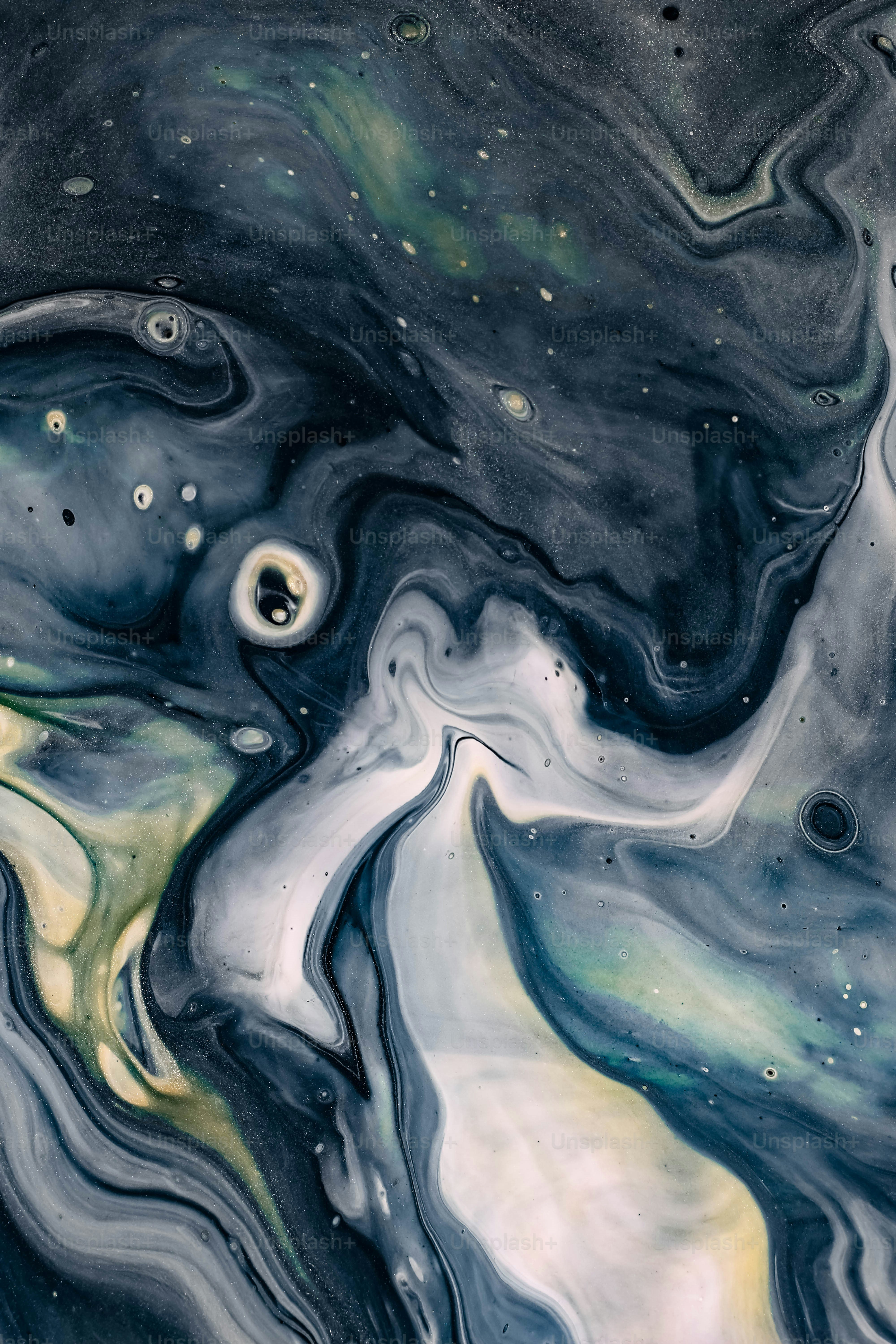 A black and white abstract painting with lots of bubbles photo Texture Image on Unsplash