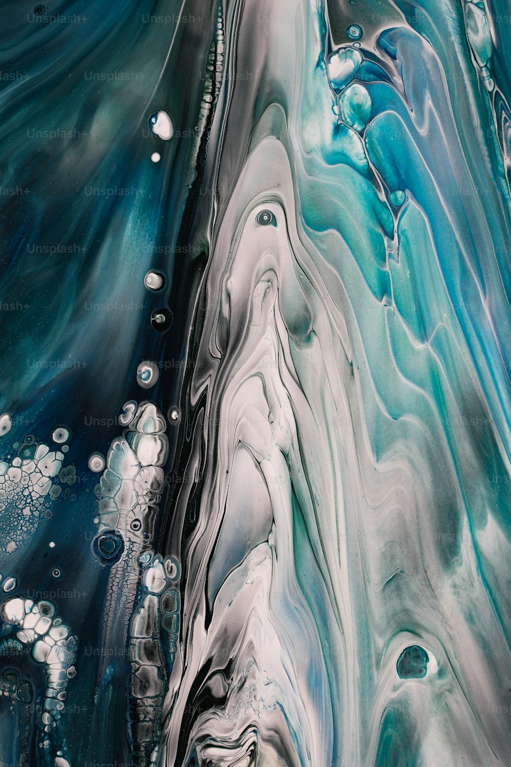 an abstract painting with blue and white colors