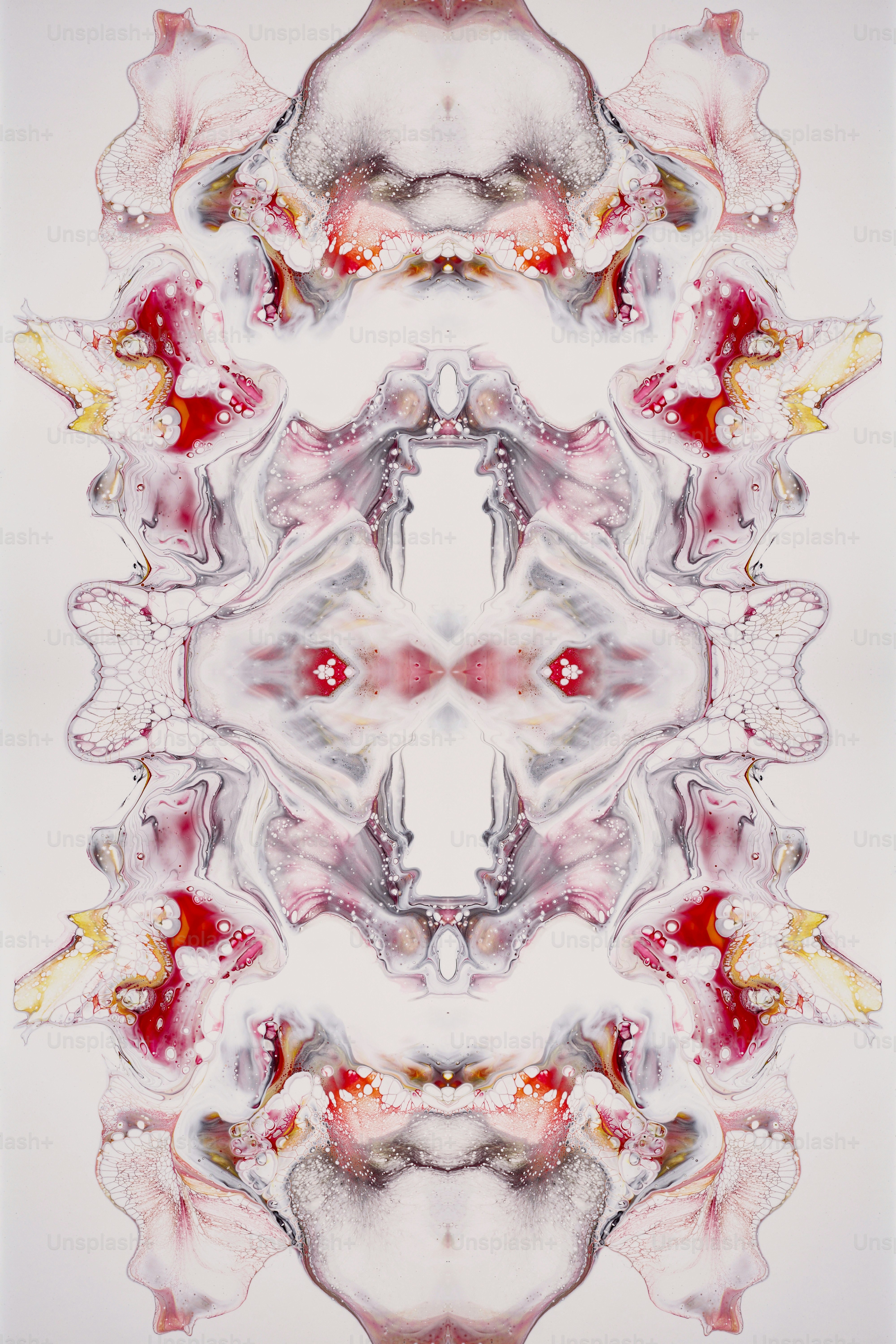 a picture of a red and white flower