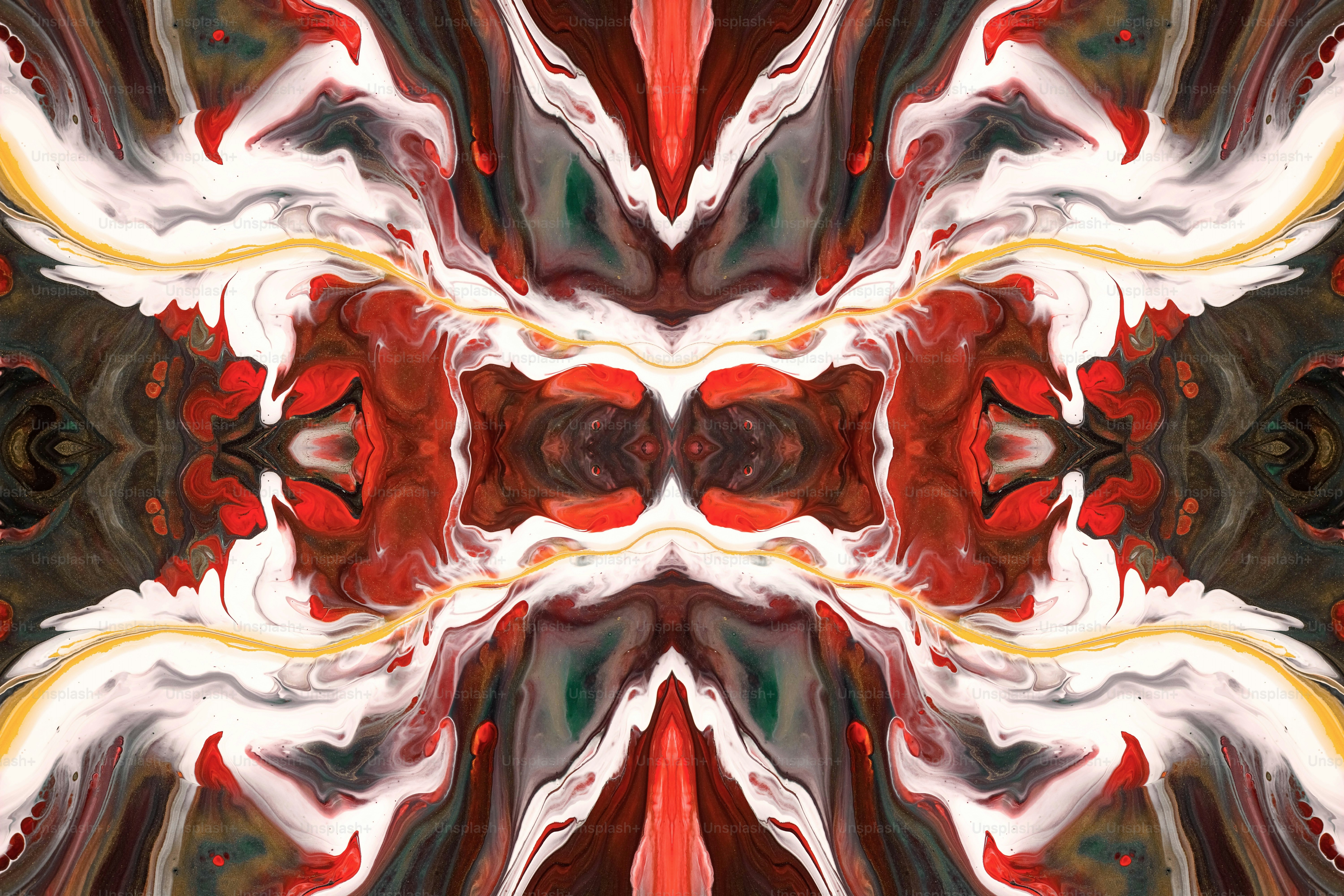 une image abstraite d’une fleur rouge, blanche et noire
