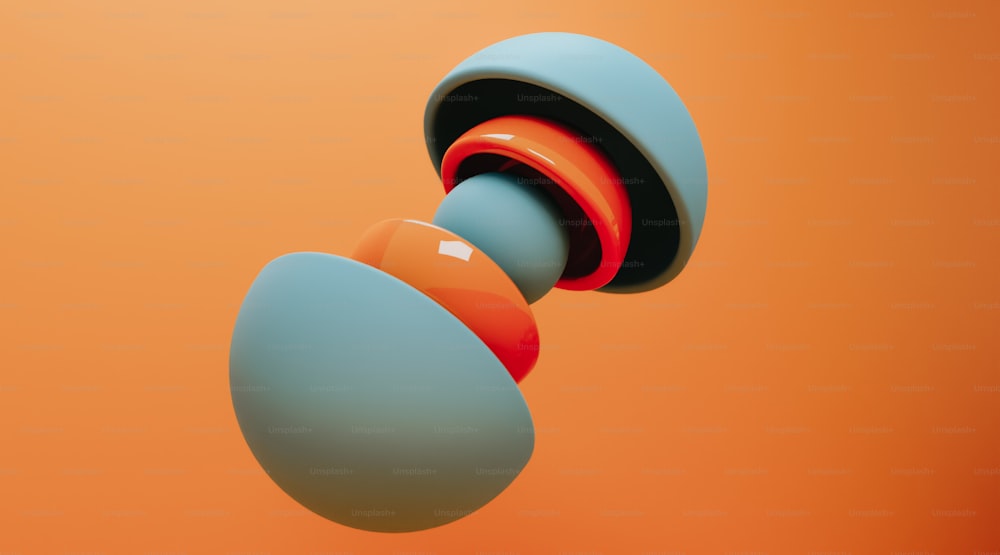 a group of three different colored knobs on an orange background