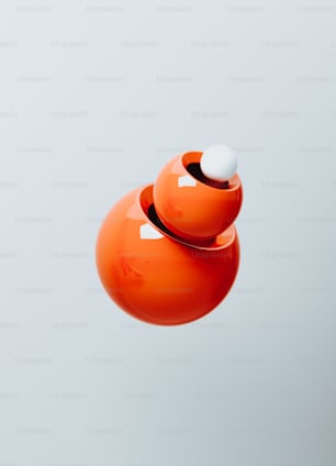 an orange object is flying in the air