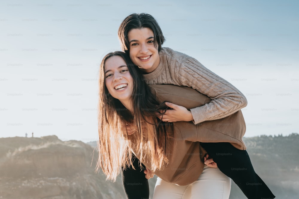 a couple of women standing next to each other