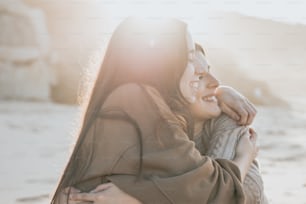 a couple of women standing next to each other