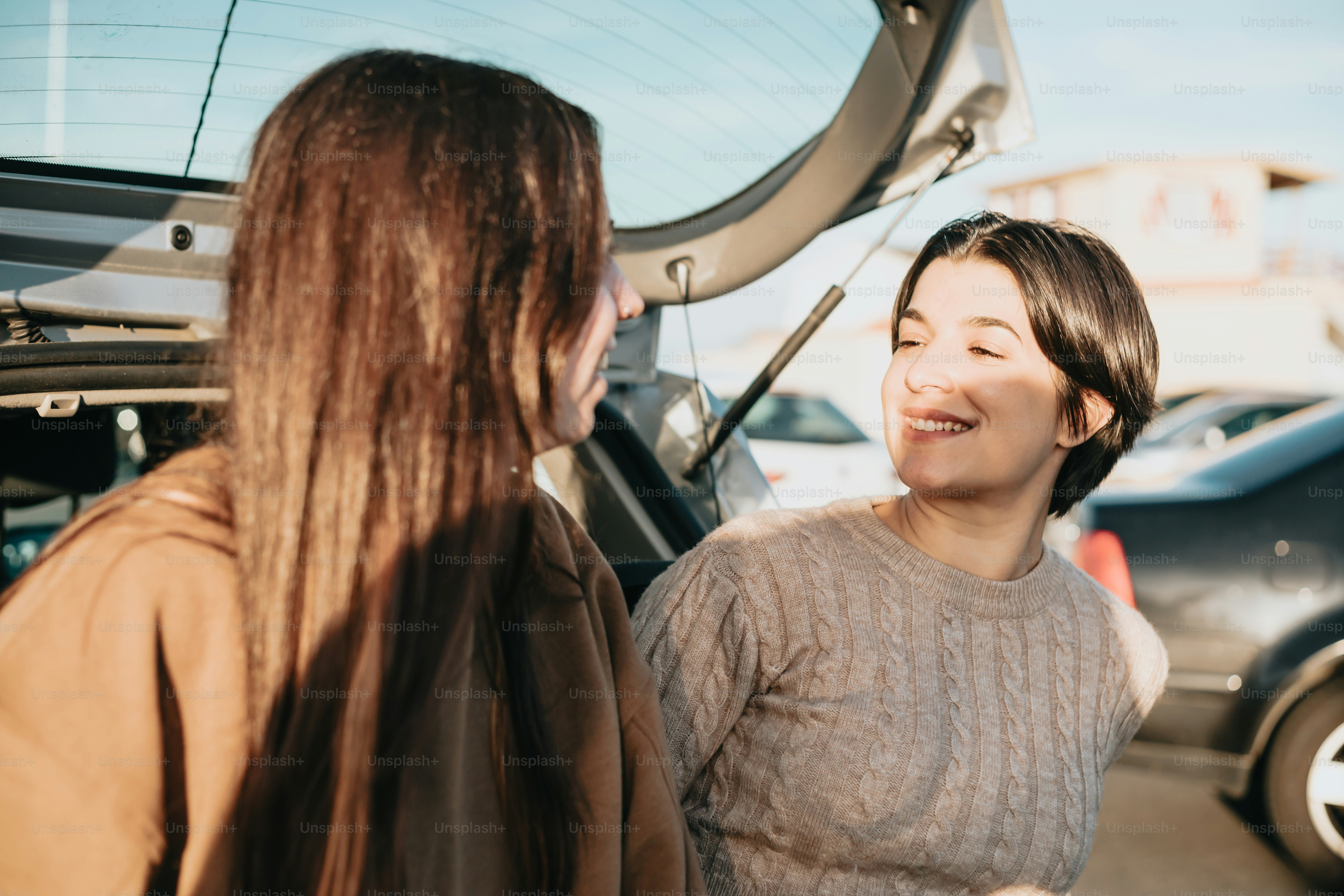 a couple of women standing next to each other