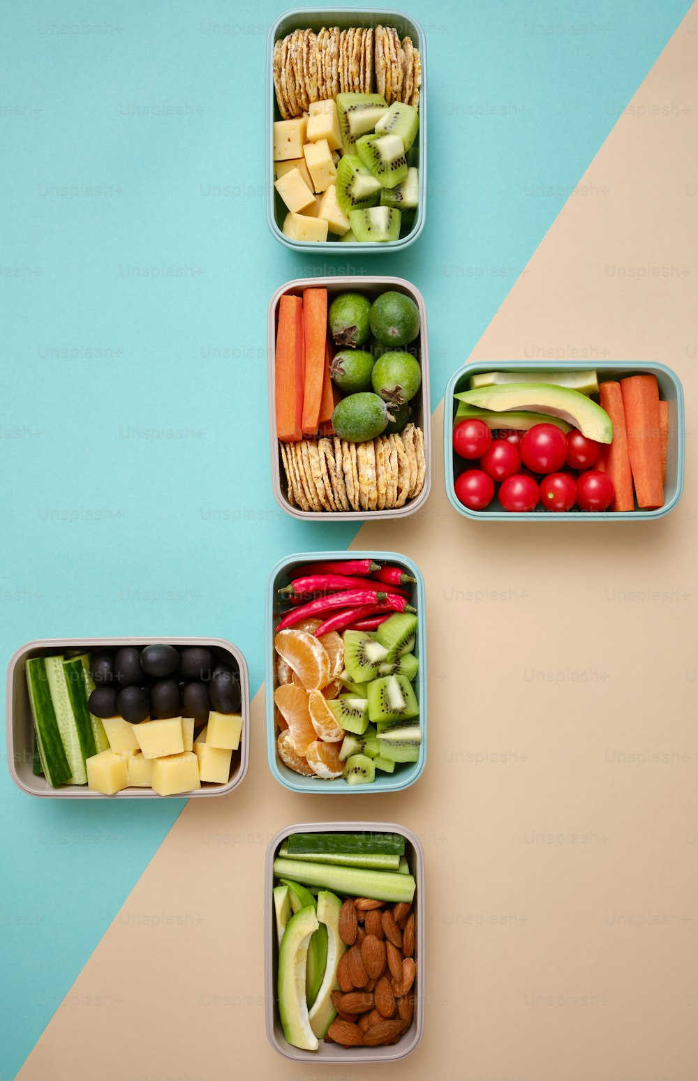 a group of containers filled with different types of food