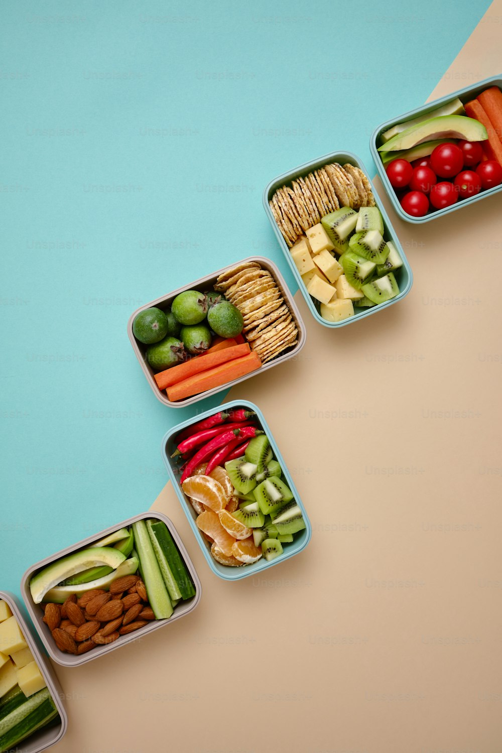a group of containers filled with different types of food