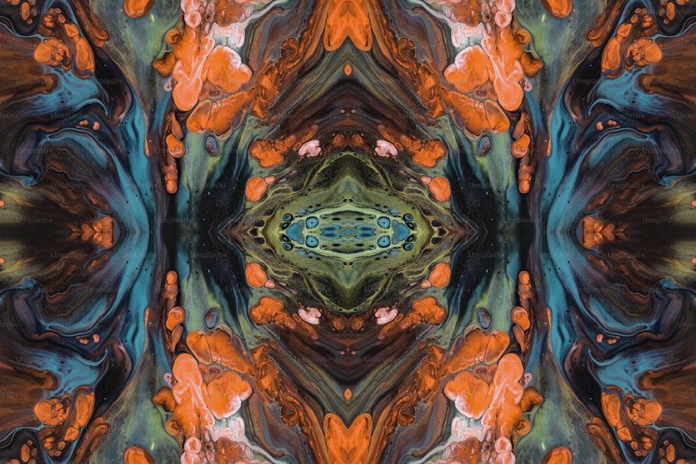 an abstract image of an orange and blue flower