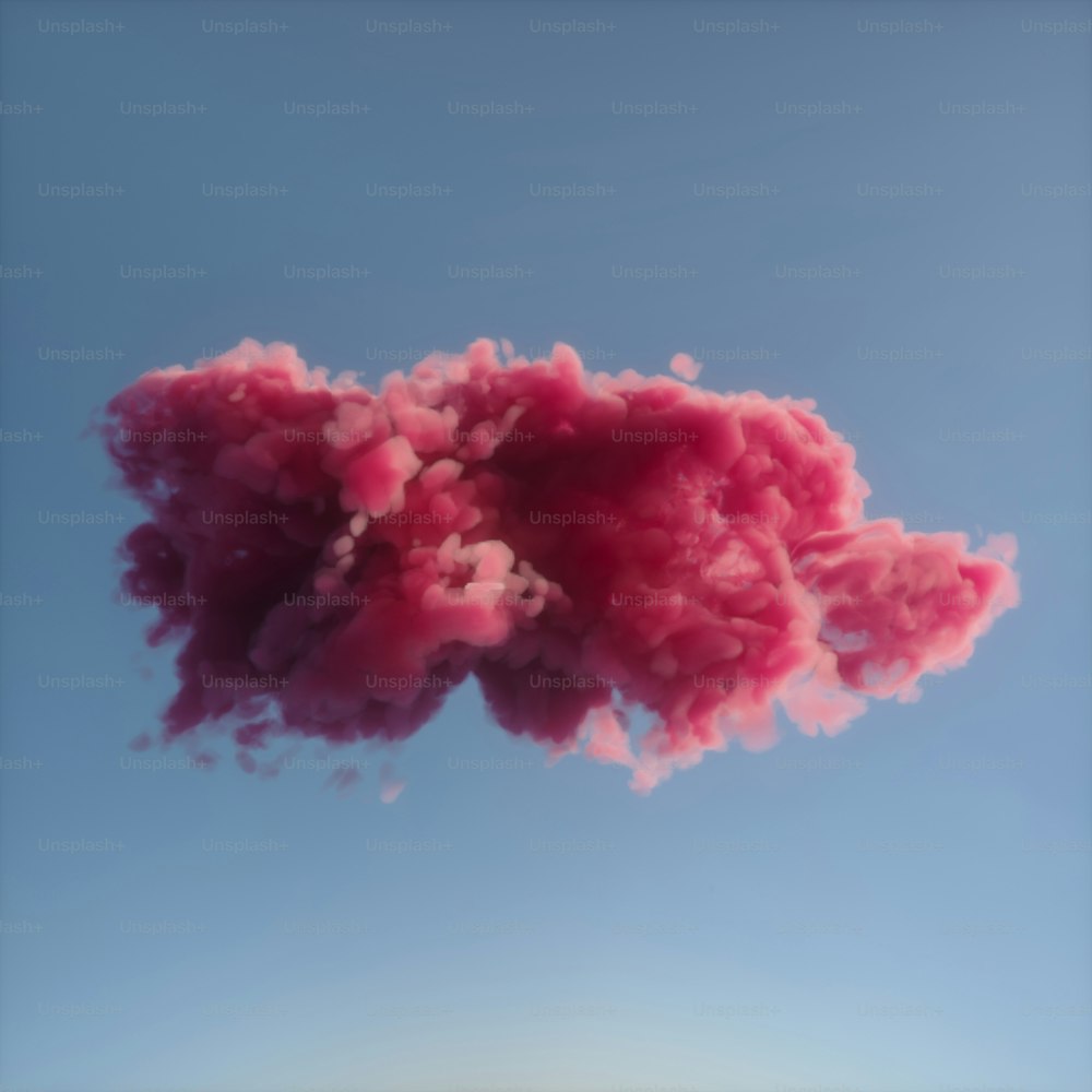 空中に浮かぶピンクの煙の雲