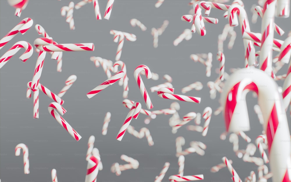 a group of candy canes flying through the air