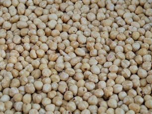 a pile of chickpeas sitting on top of a table