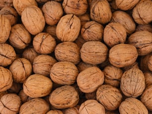 a pile of walnuts is shown in this image