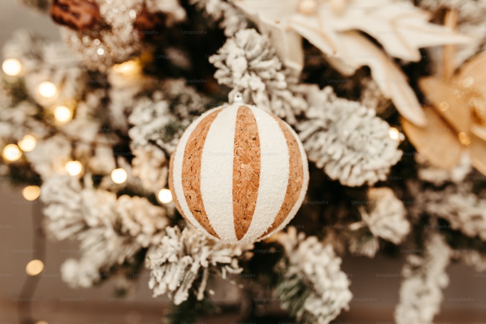 a close up of a christmas ornament on a tree