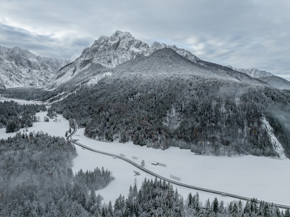 a scenic view of a snowy mountain range