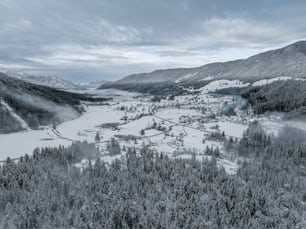 an aerial view of a snowy mountain town