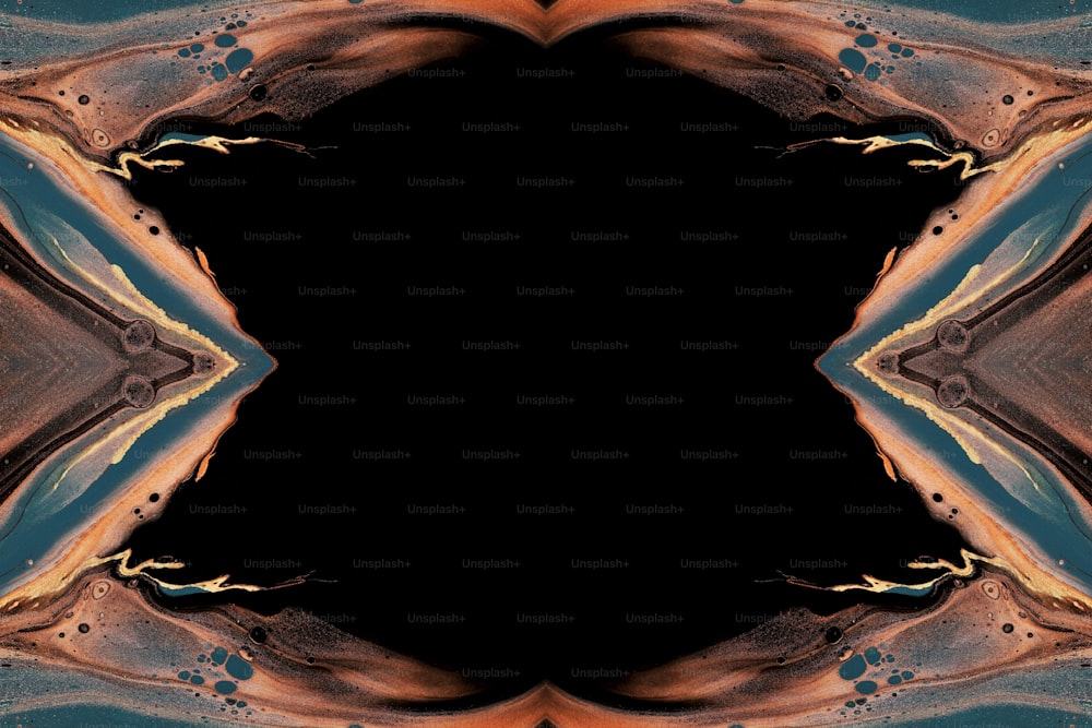 ein Bild eines schwarzen Hintergrunds mit einem orangefarbenen und blauen Design
