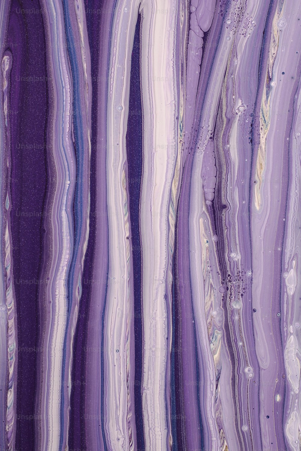 an abstract painting of purple and white stripes