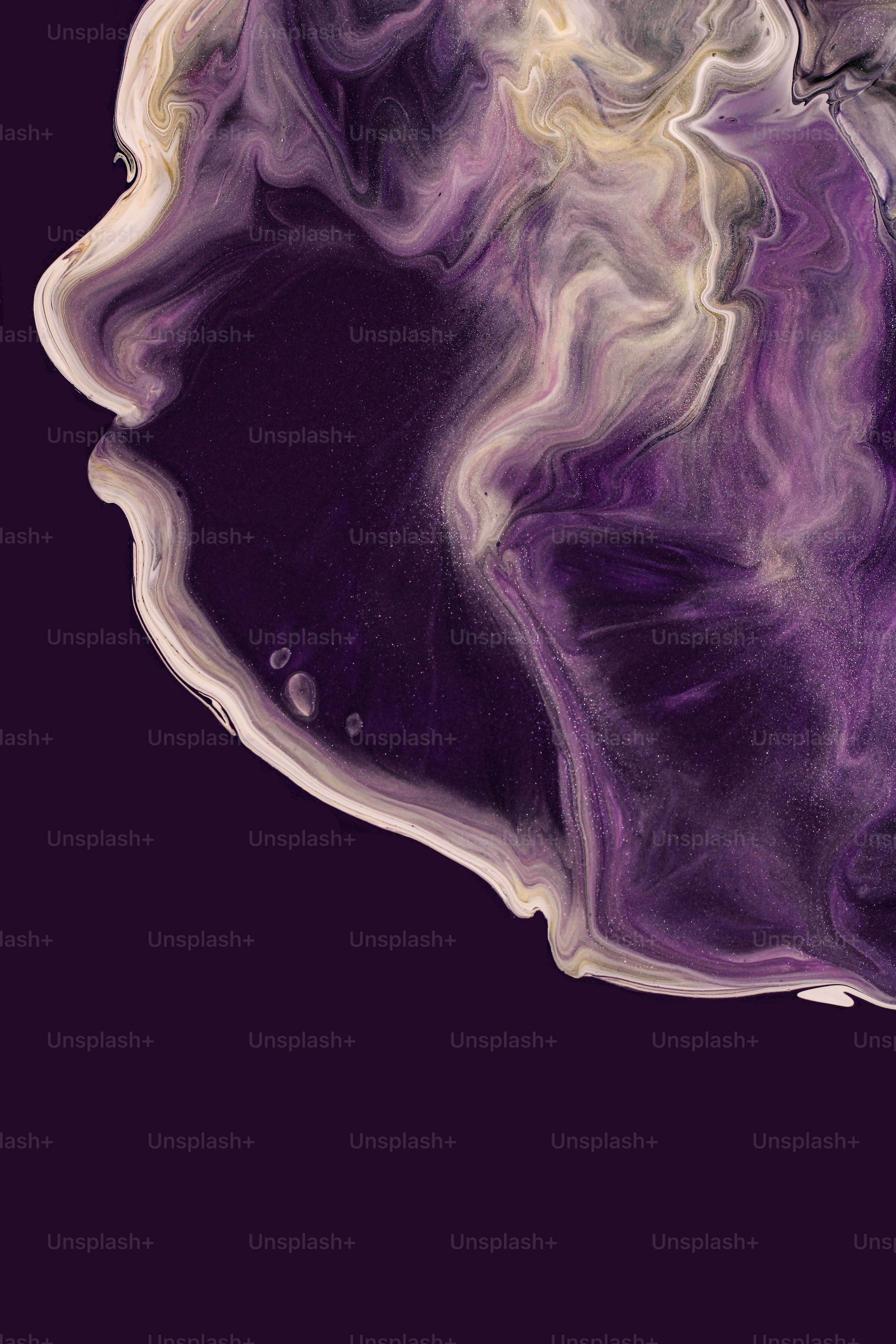 a close up of a cell phone with a purple background