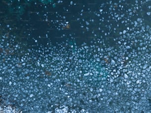 a close up of a window with rain drops on it