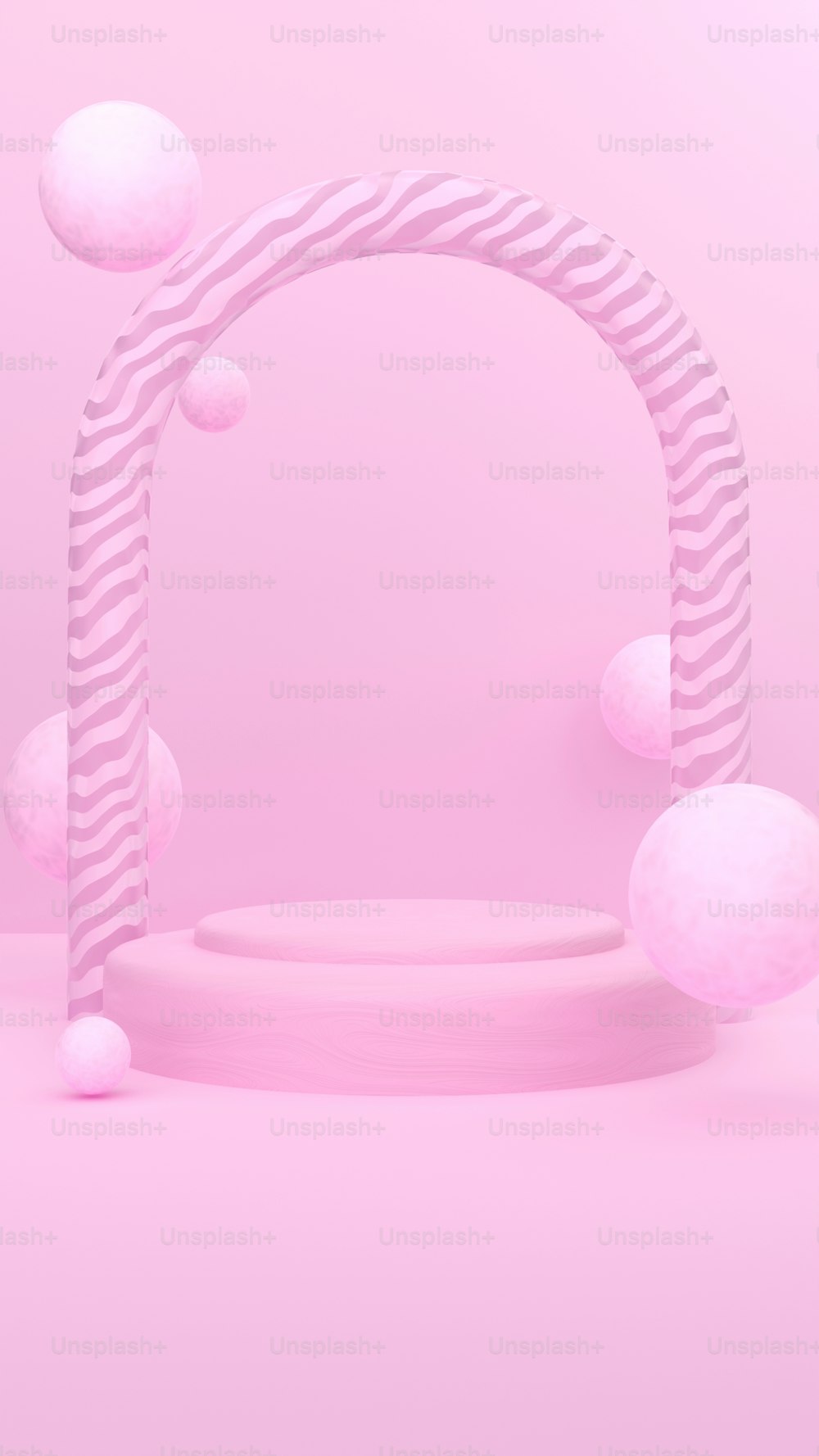 un fondo rosa con un objeto circular en el medio