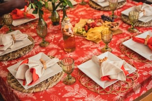 a table set with place settings and napkins