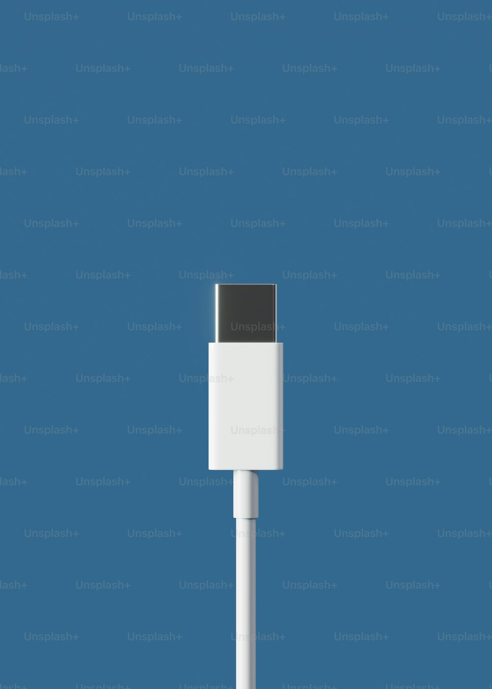 a close up of a white cable with a blue background