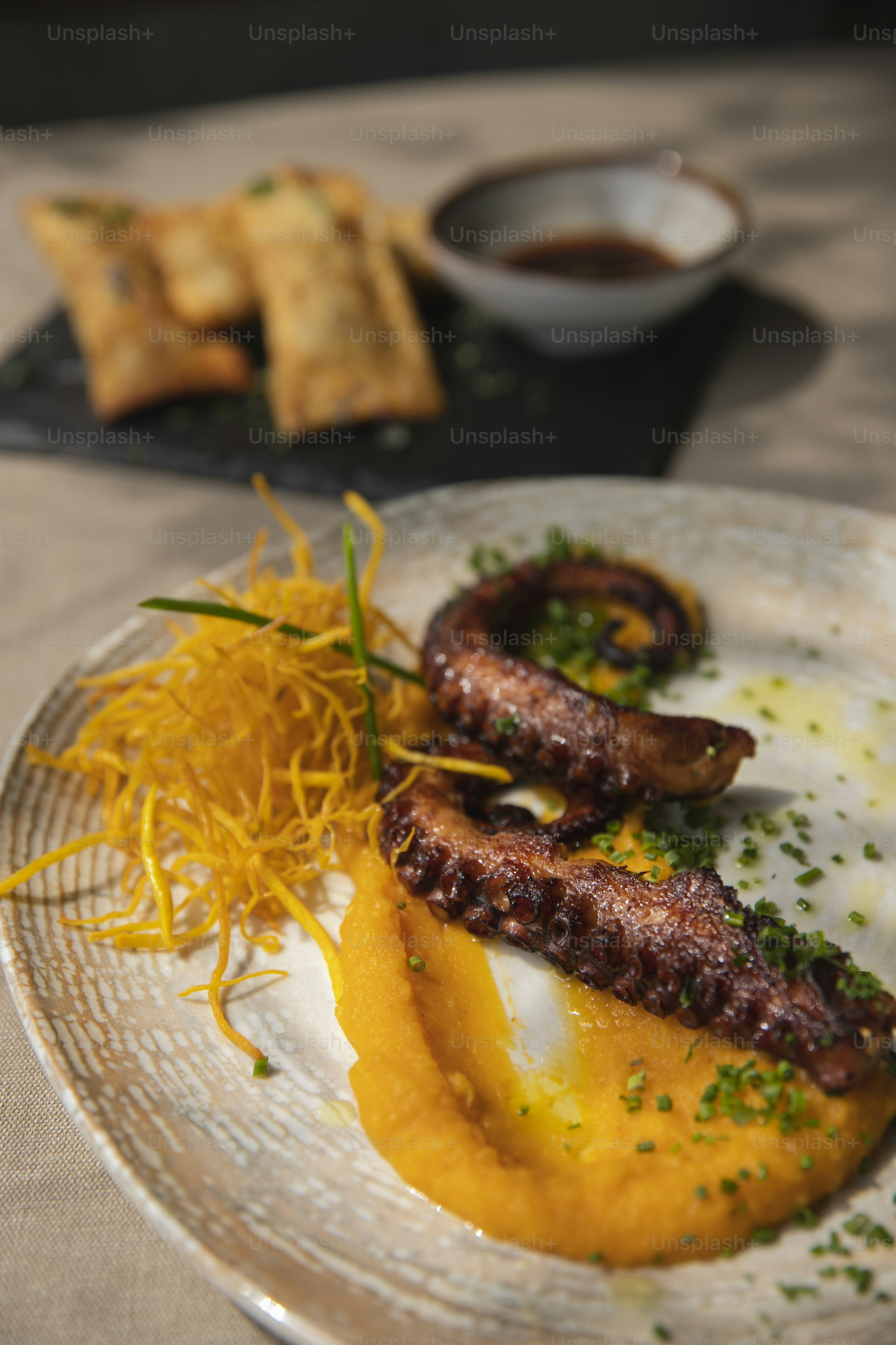 a white plate topped with food on top of a table