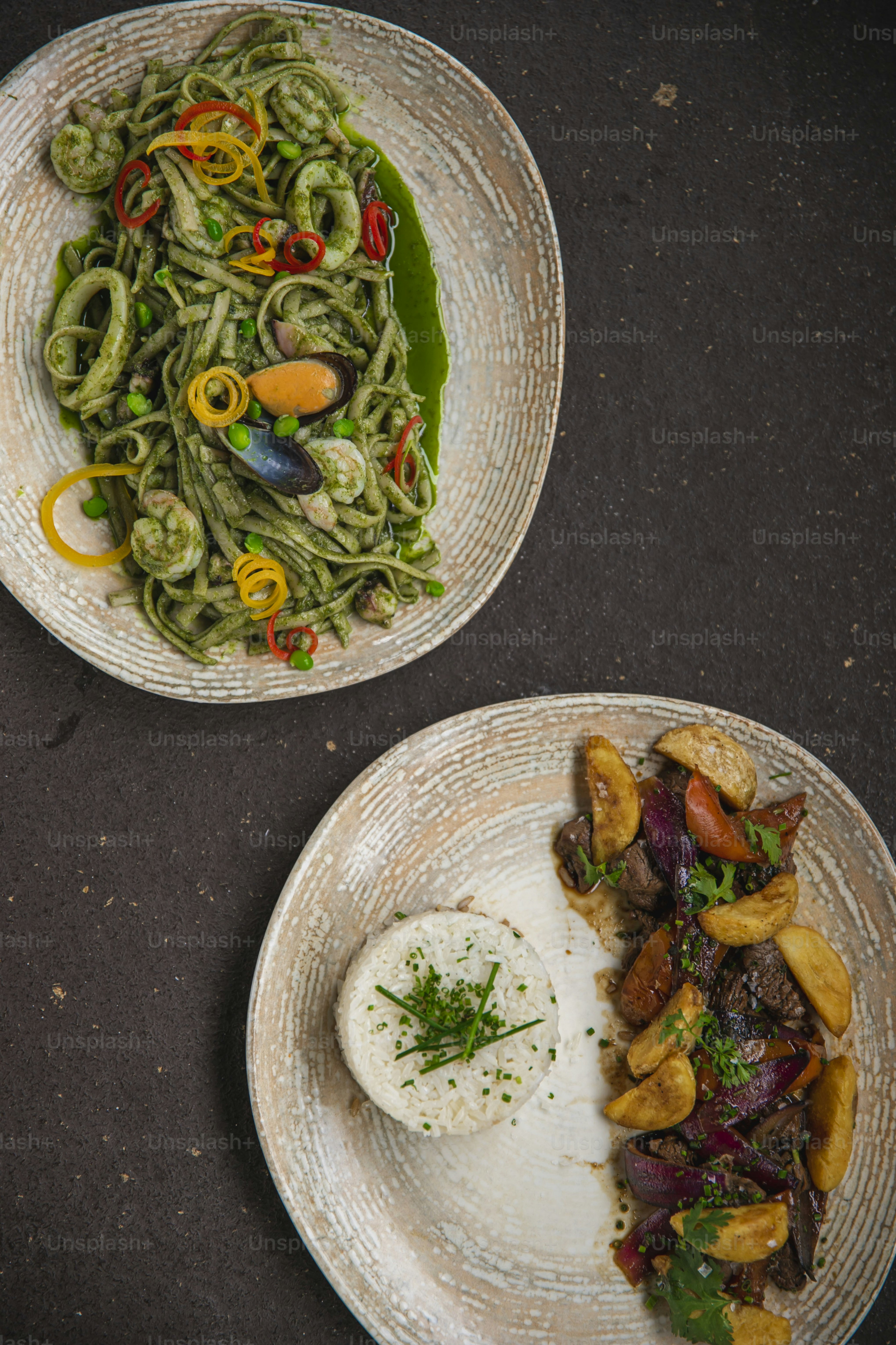 a couple of plates of food on a table