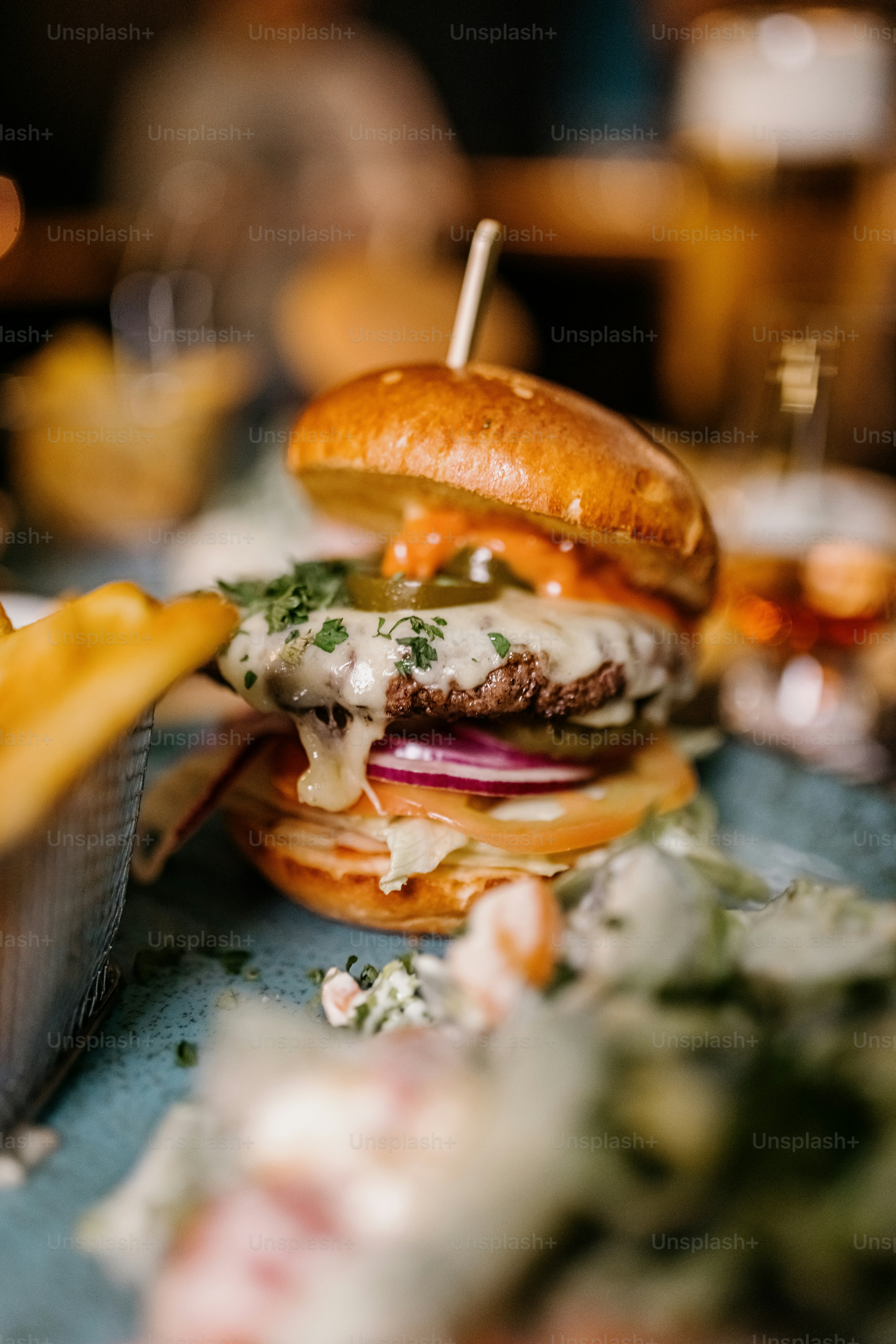 a hamburger and fries on a table