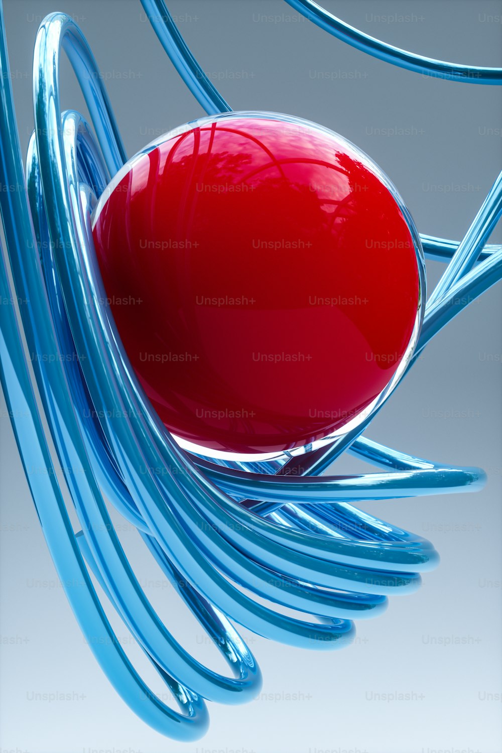 un objet rouge assis sur un objet bleu
