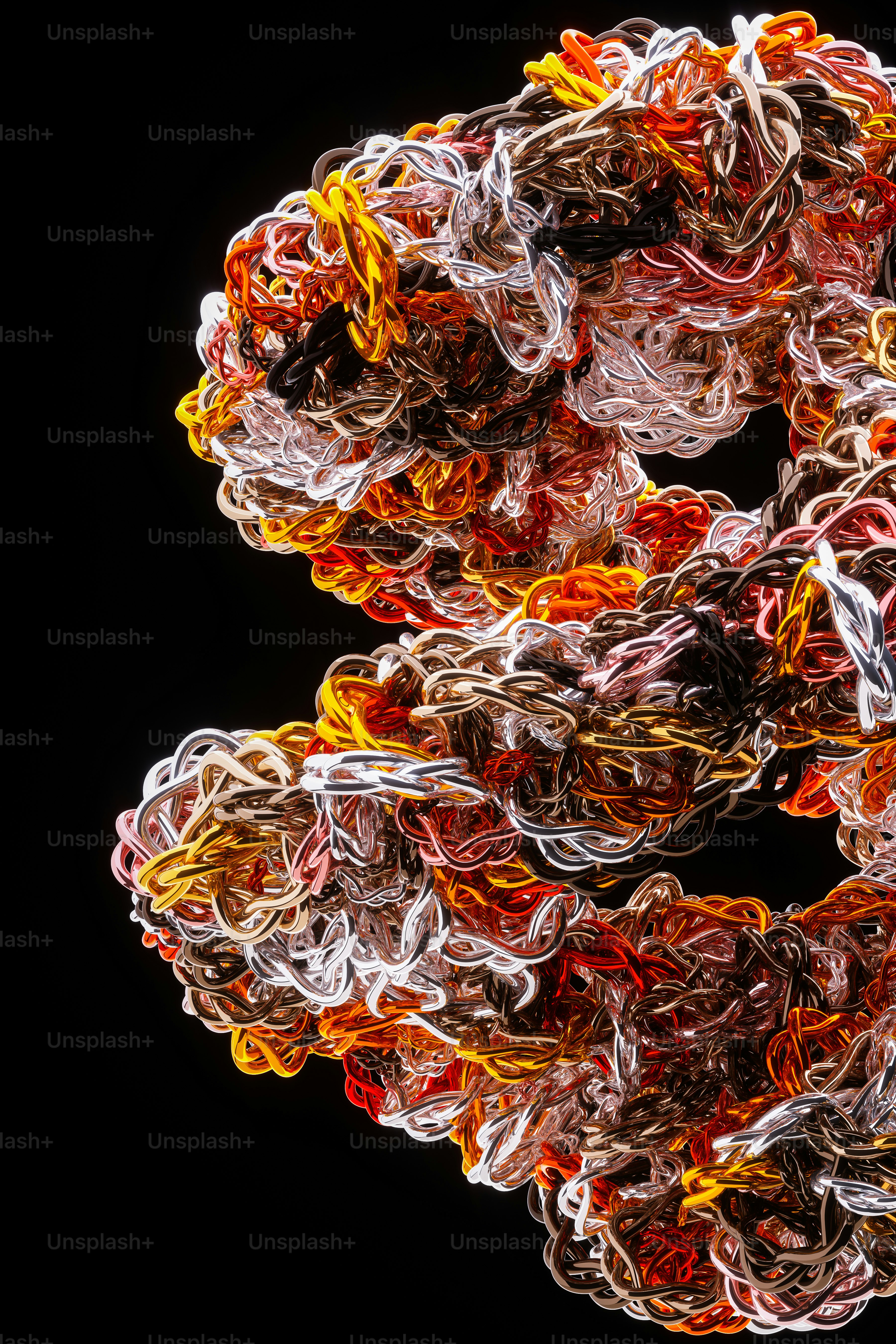 a group of multicolored objects on a black background