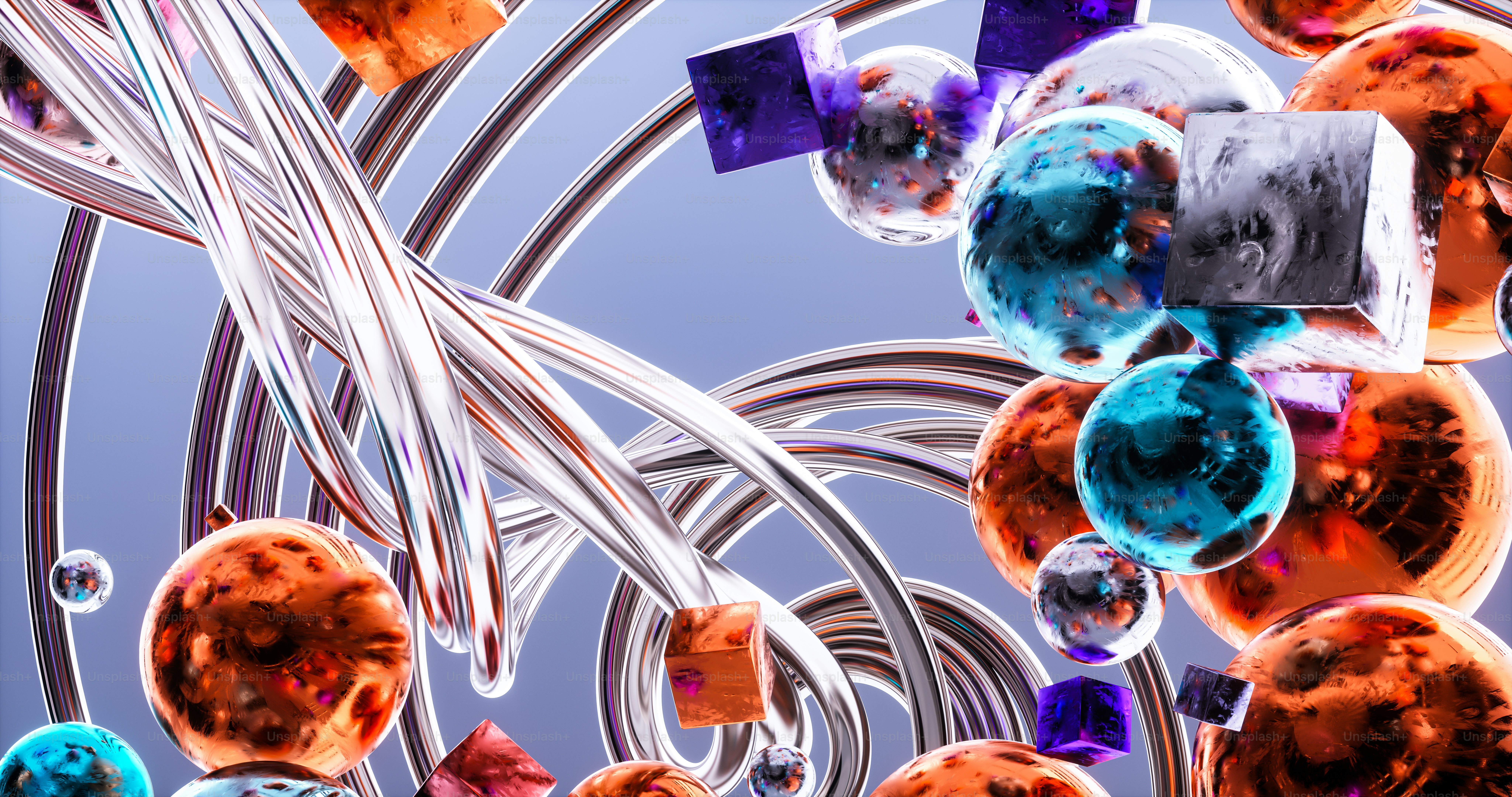 a bunch of different colored objects hanging from a ceiling