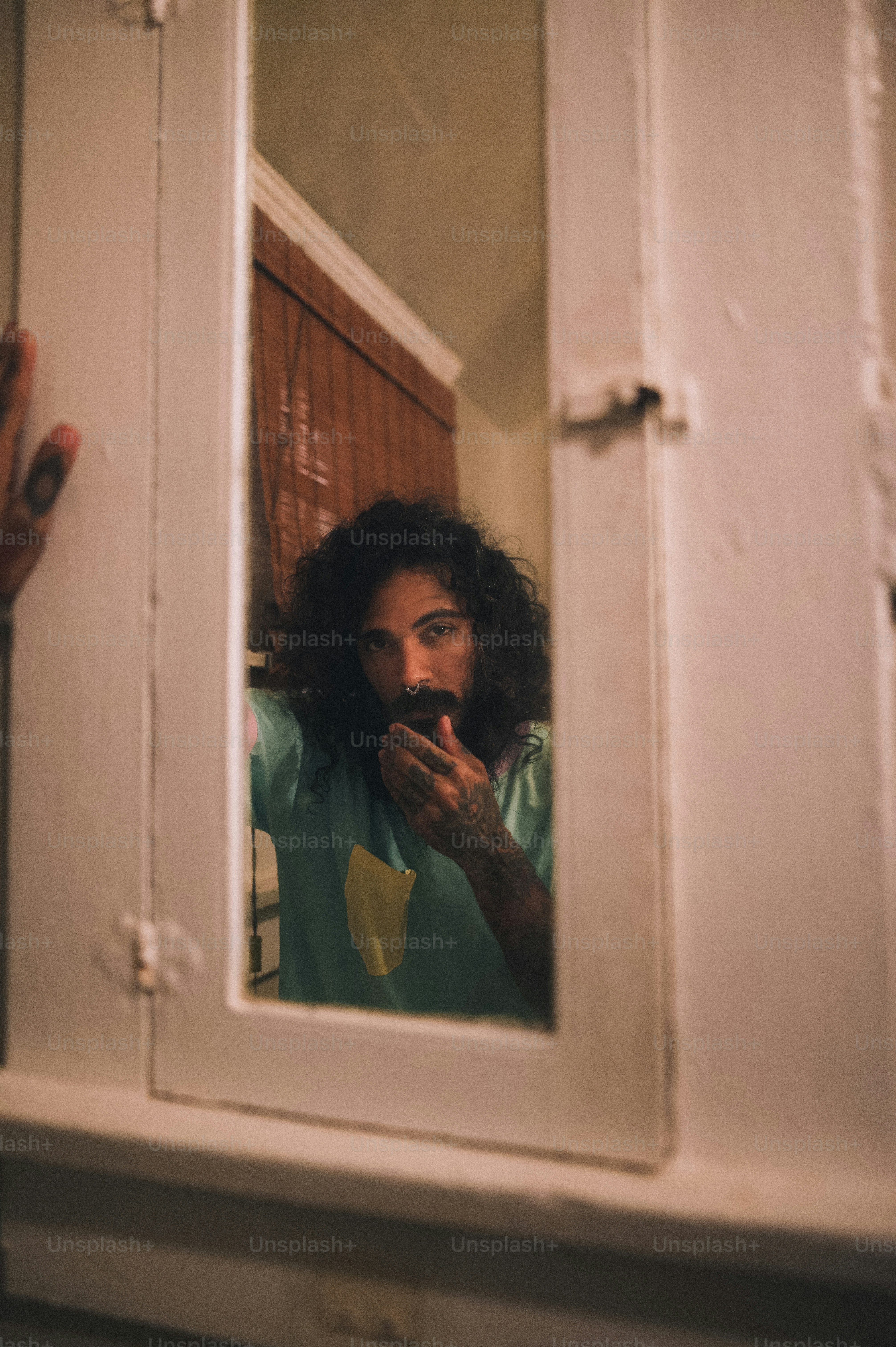 a man taking a picture of himself in a mirror