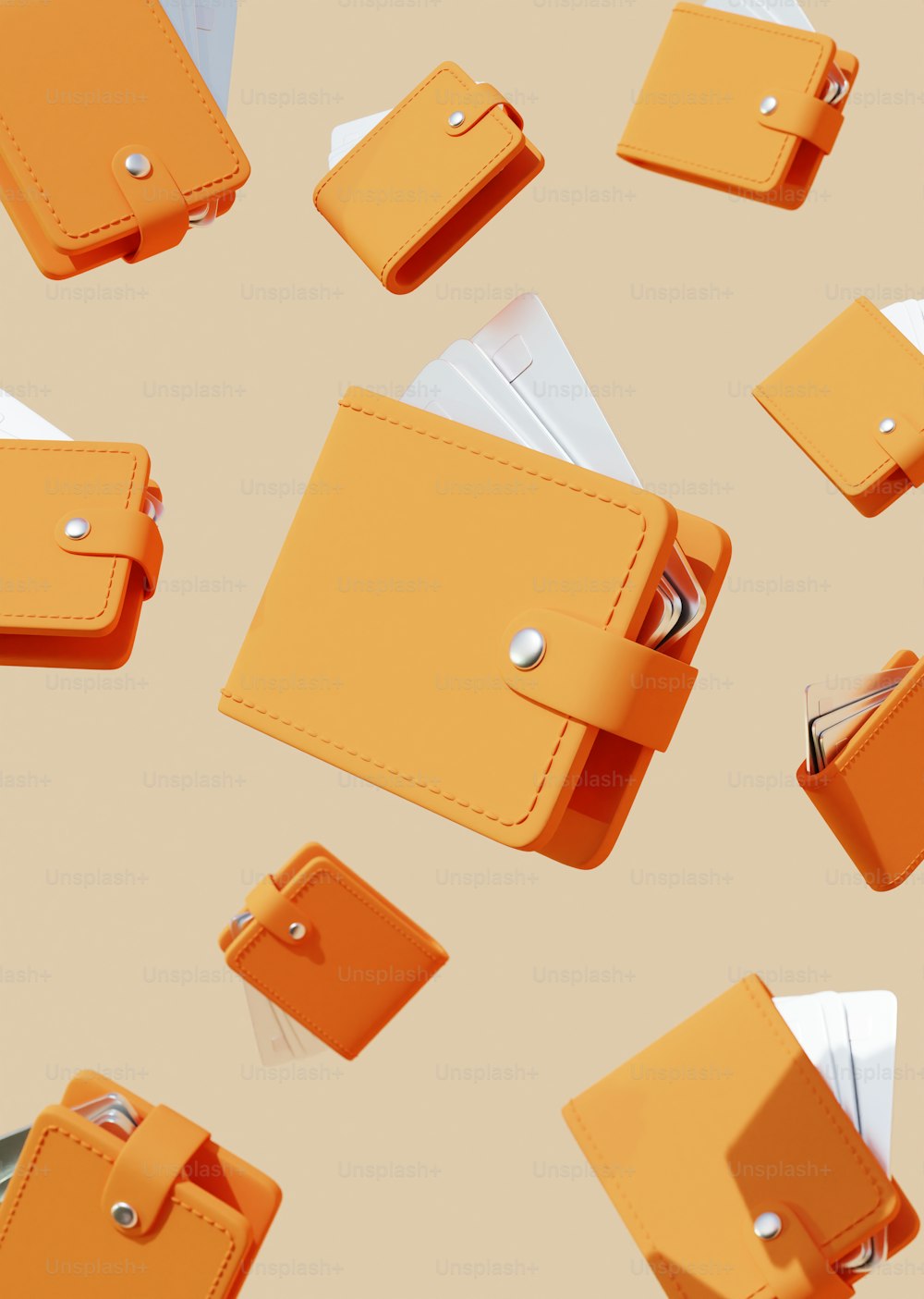 a group of orange wallets sitting on top of a table