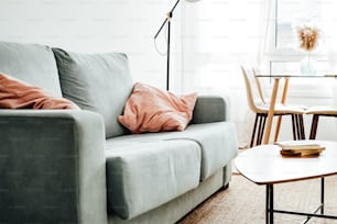 a living room filled with furniture and a table