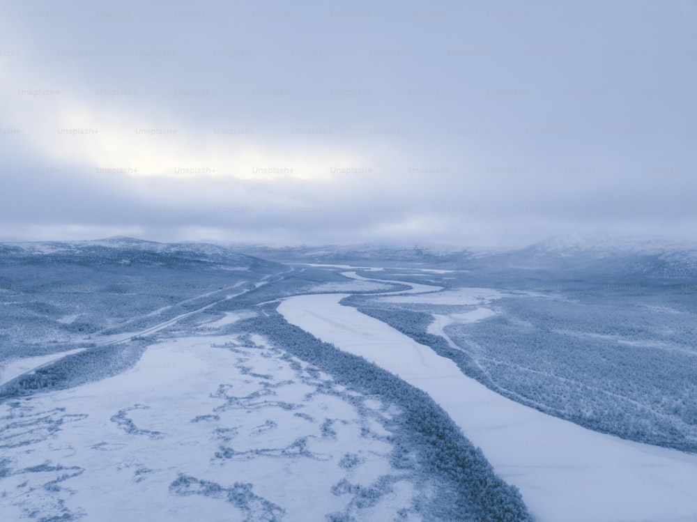 a river running through a snow covered landscape