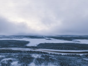 an aerial view of a snow covered area