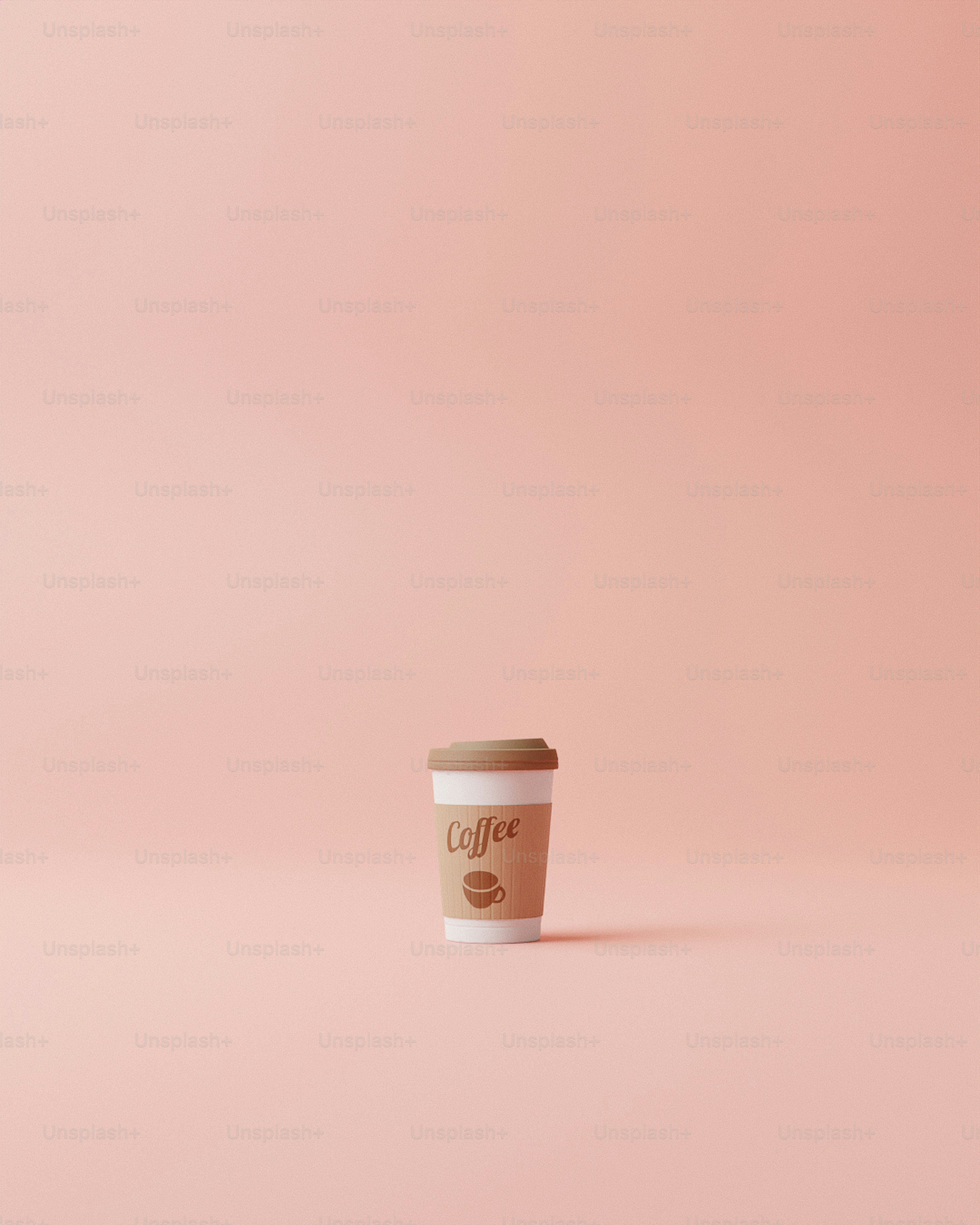 a cup of coffee on a pink background